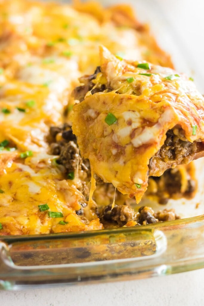 Easy Ground Beef Enchilada Casserole Recipe (Layered) - Restless Chipotle