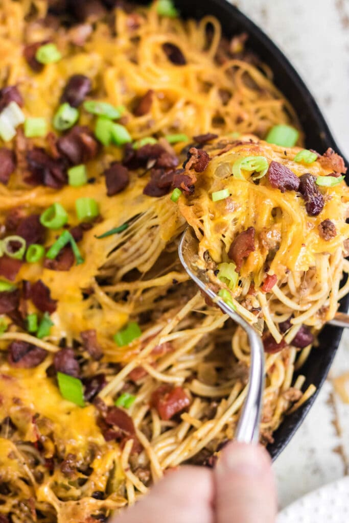 Cheesy Cowboy Spaghetti Recipe ( in an Iron Skillet) - Restless Chipotle