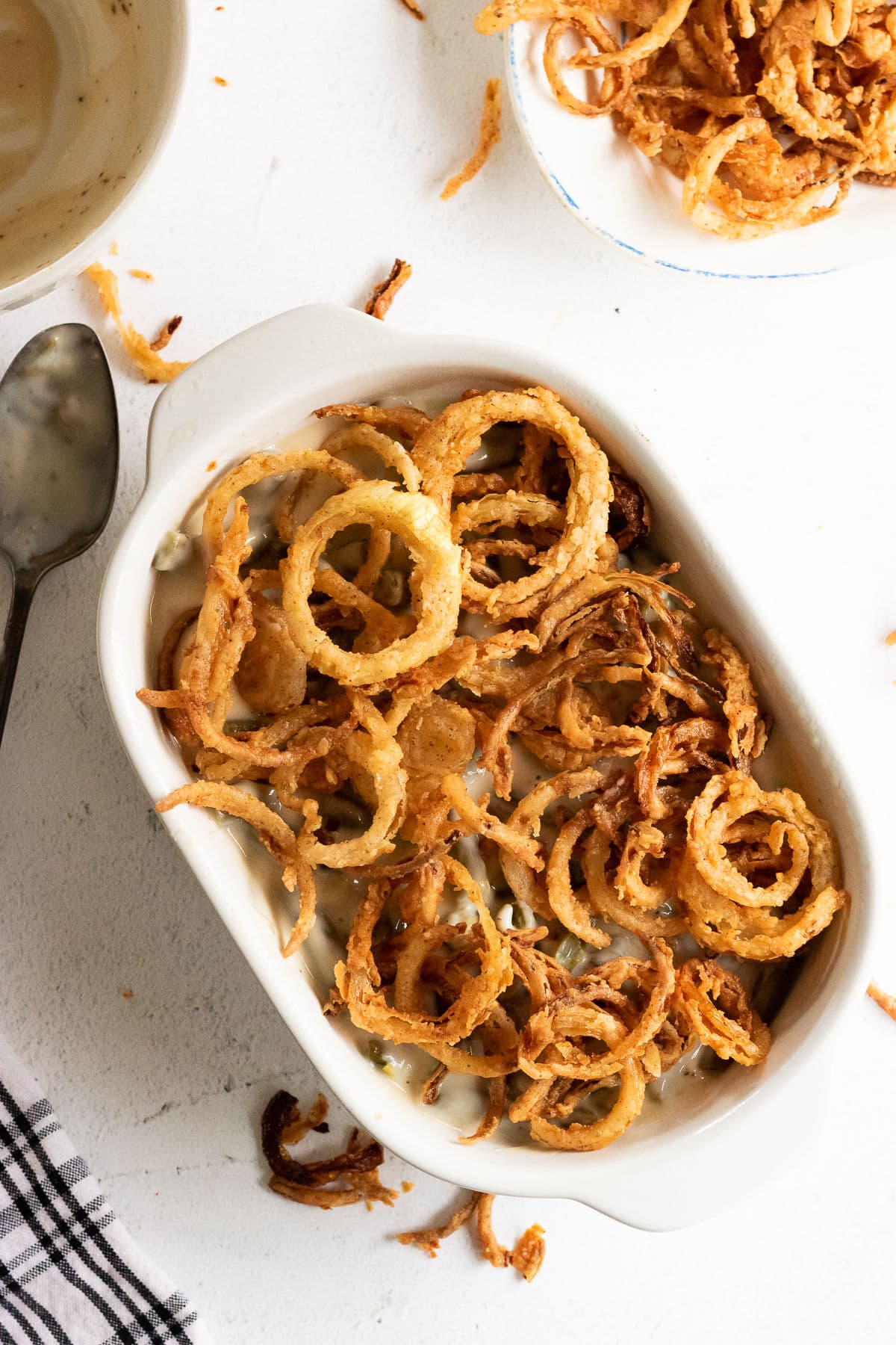 Overhead view of casserole with crispy fried onions on top.