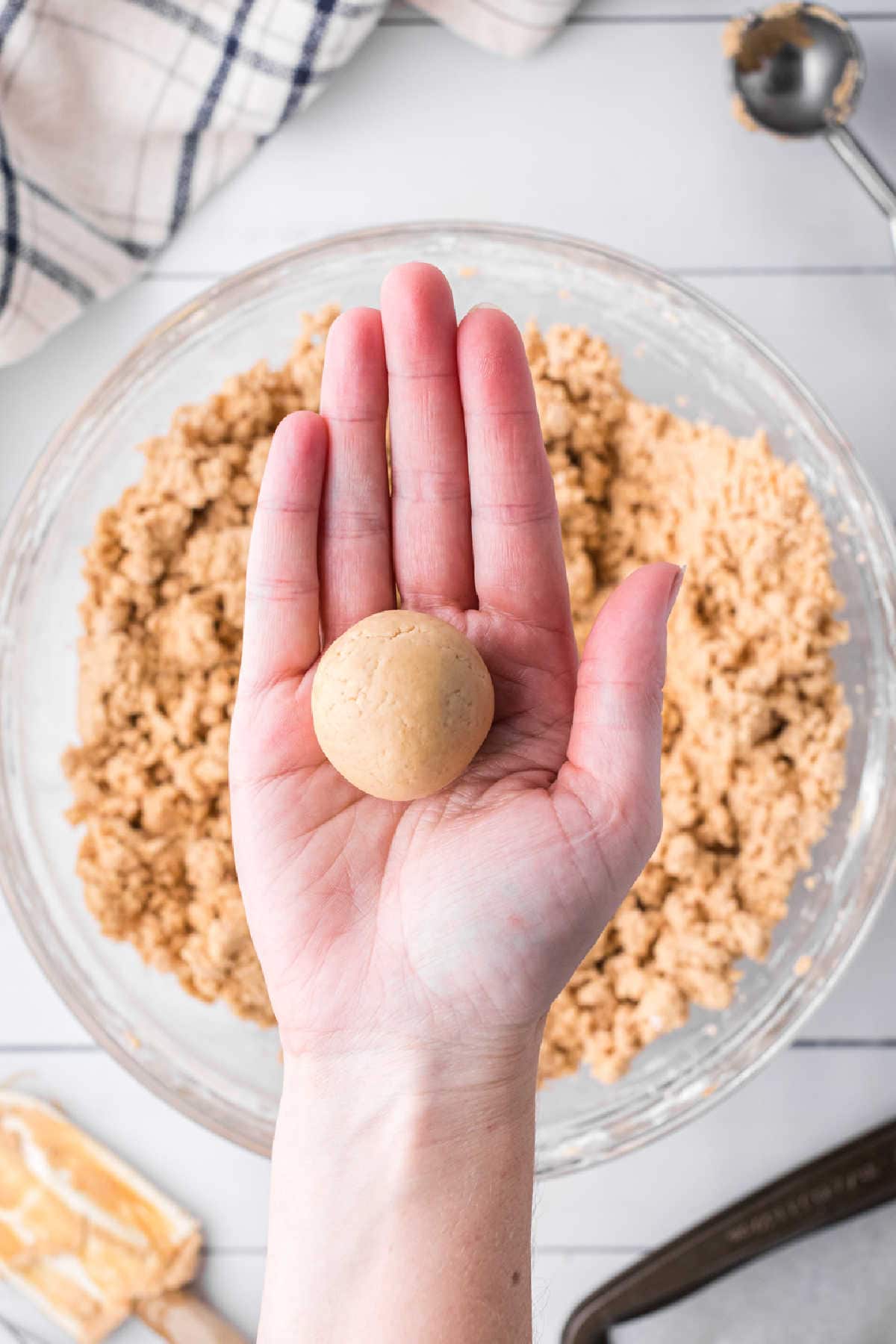 Peanut butter mixture formed into a ball.