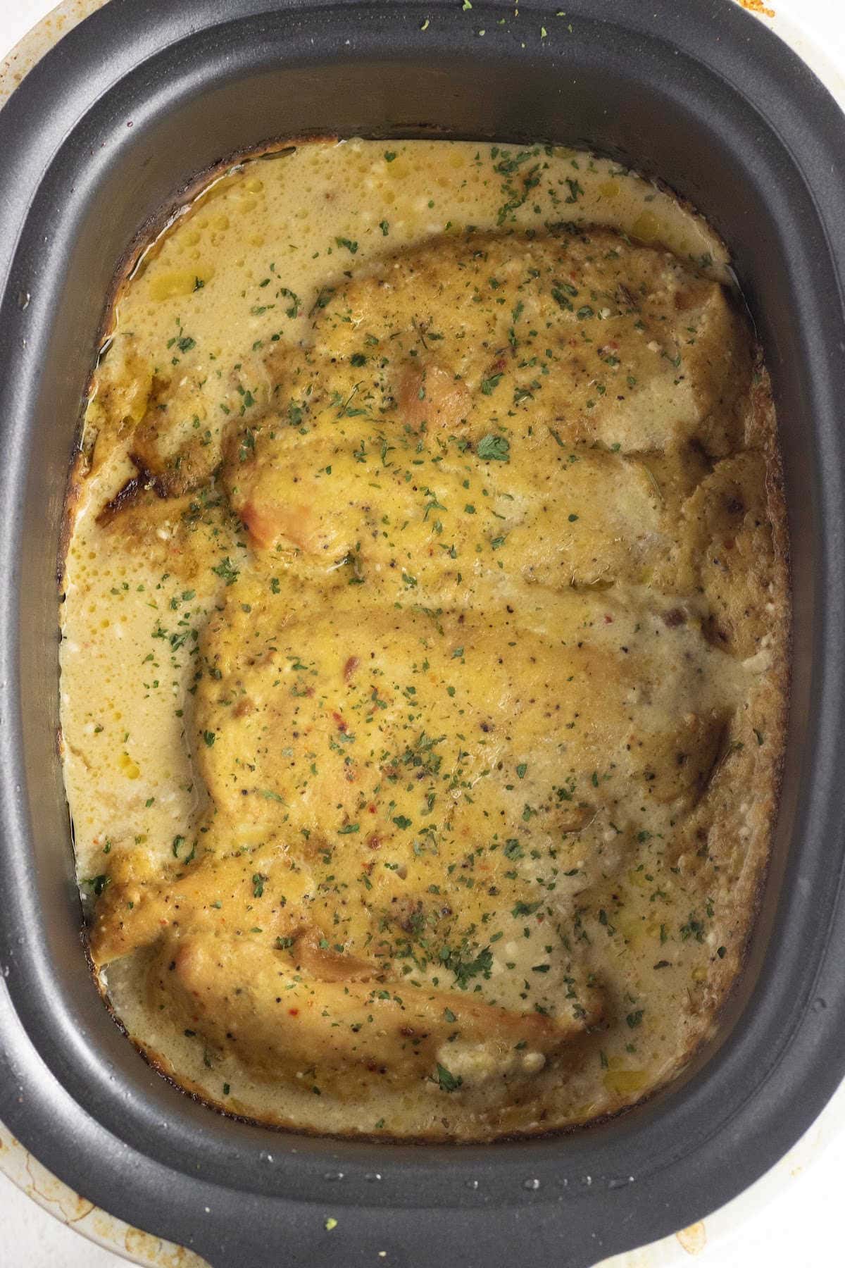 Overhead view of creamy angel chicken in the slow cooker.