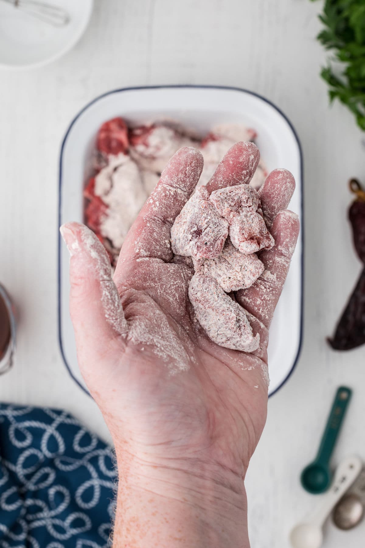 Beef that has been dredged in the flour mixture.