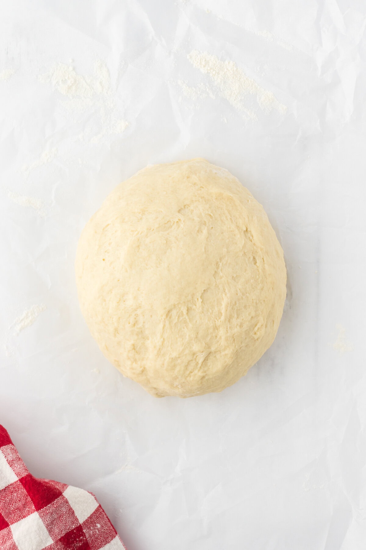 Finished dough is formed into a ball.