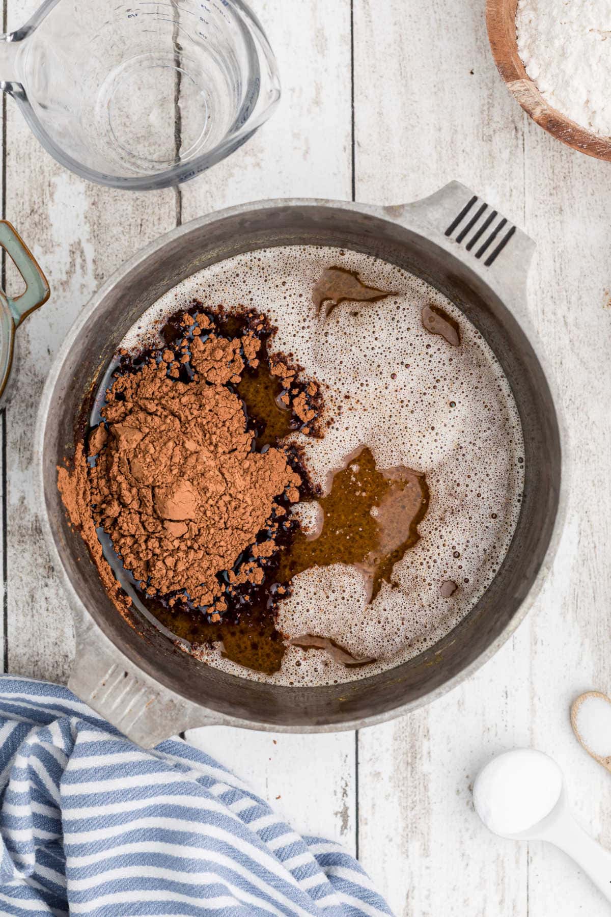 A pan with browned butter and cocoa in it.