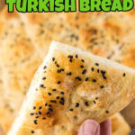 A piece of Turkish bread in someone's hand with a title text overlay for Pinterest.