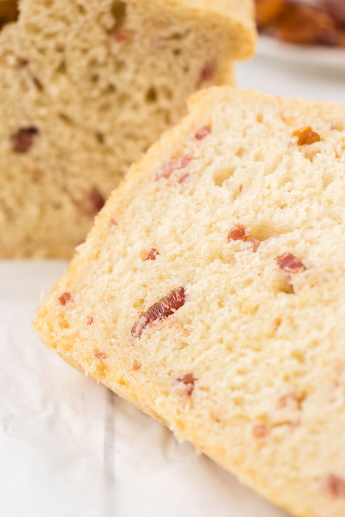 Closeup of slices of bacon bread.