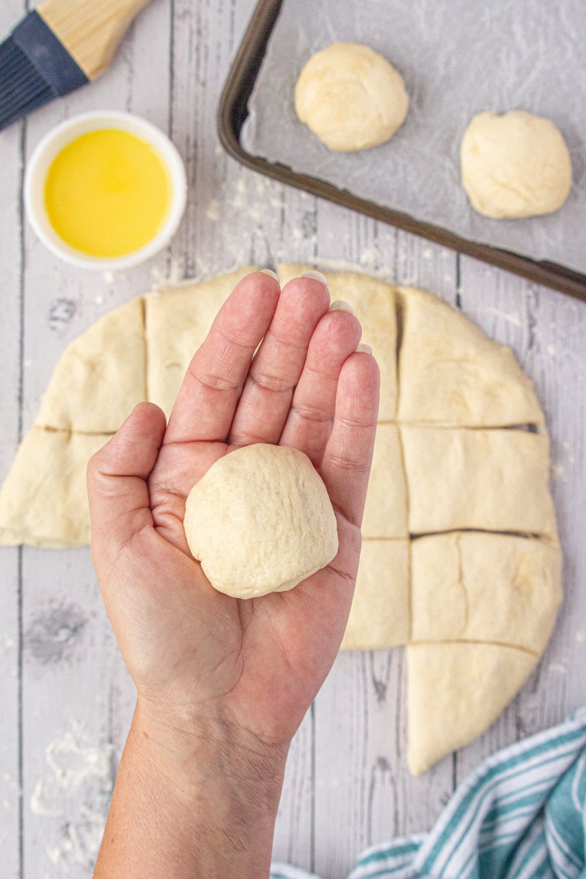 Forming the rolls with the dough.