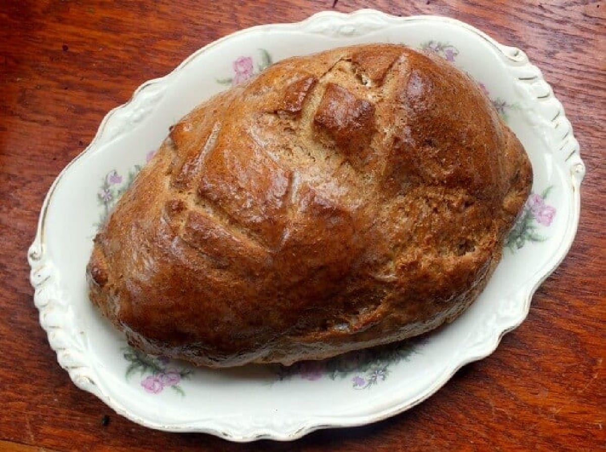 Overhead view of a loaf of Limpa that is not sliced, showing the diamond pattern in the crust.