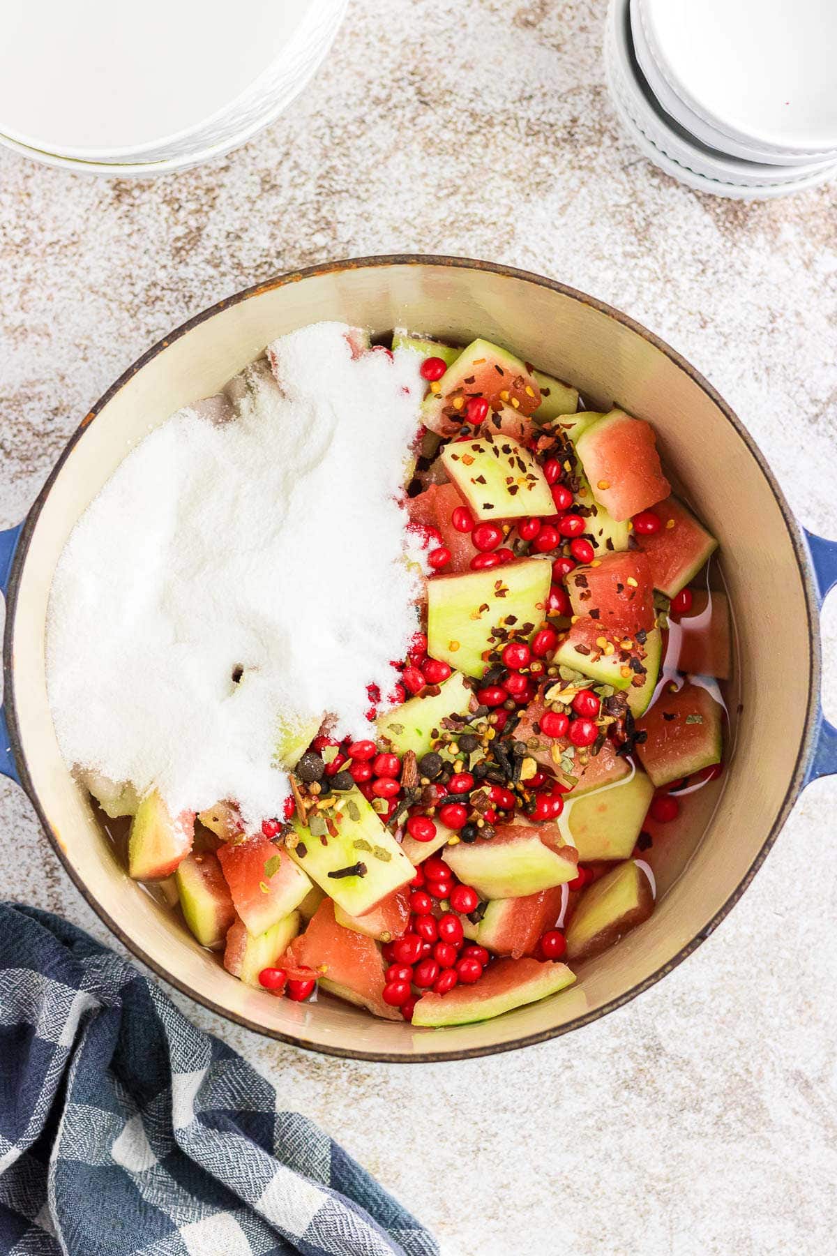 All of the pickled watermelon rind ingredients in a large pot.