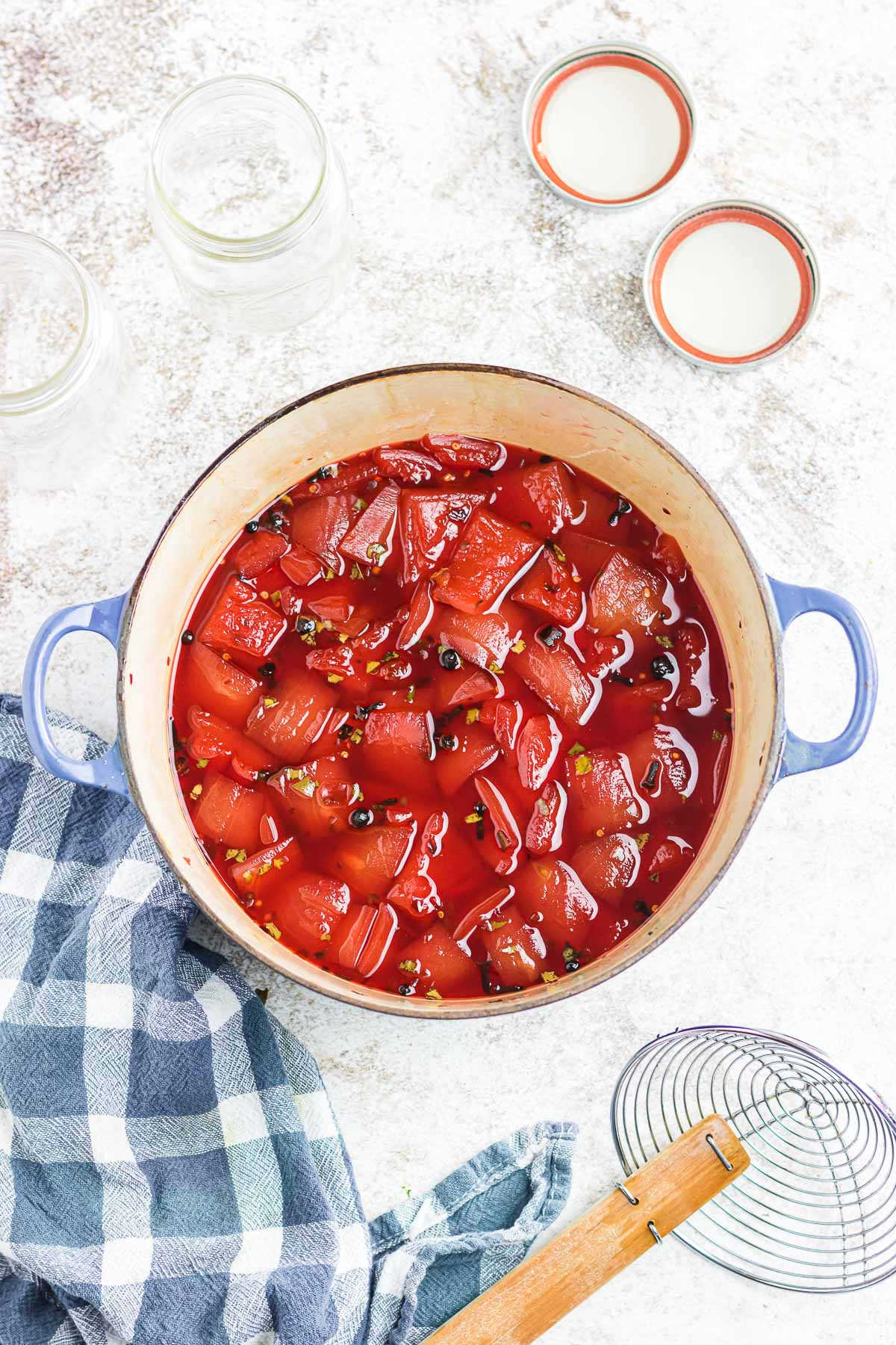 Pickled watermelon rind simmering in a big pot.