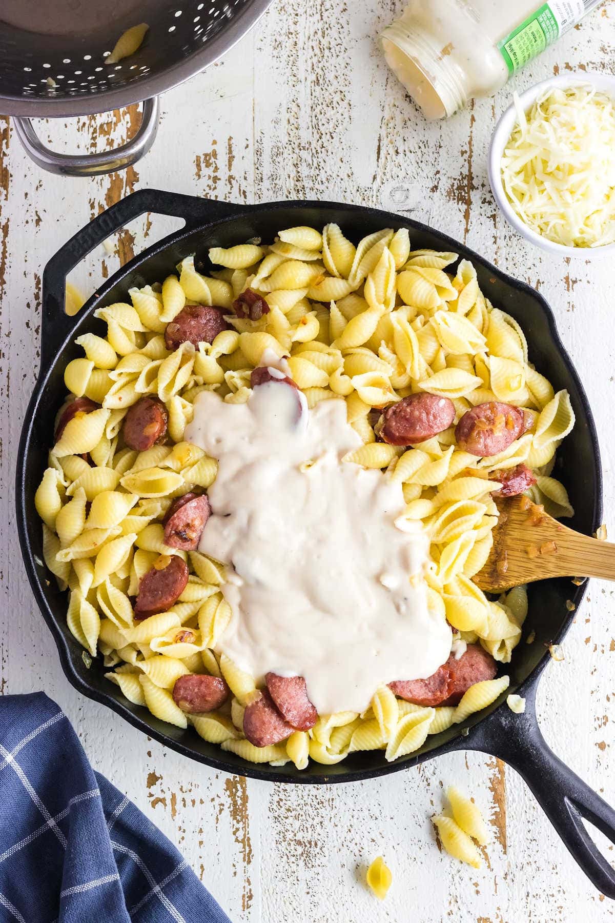 pasta and Alfredo sauce added to the smoked sausage.
