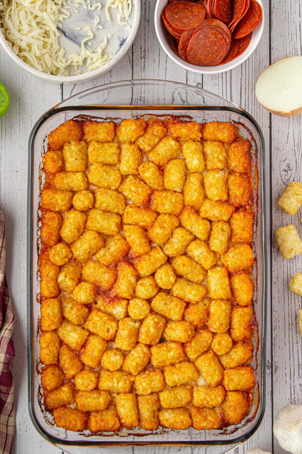 Tater Tots over the beef mixture.