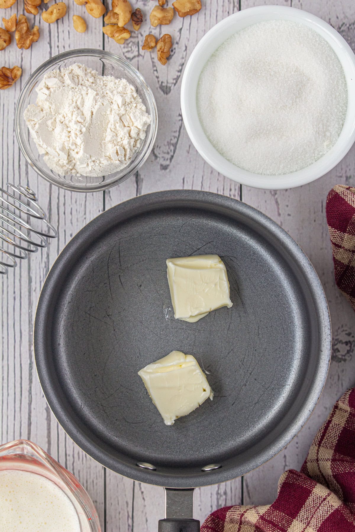 Butter being melted in a pan.