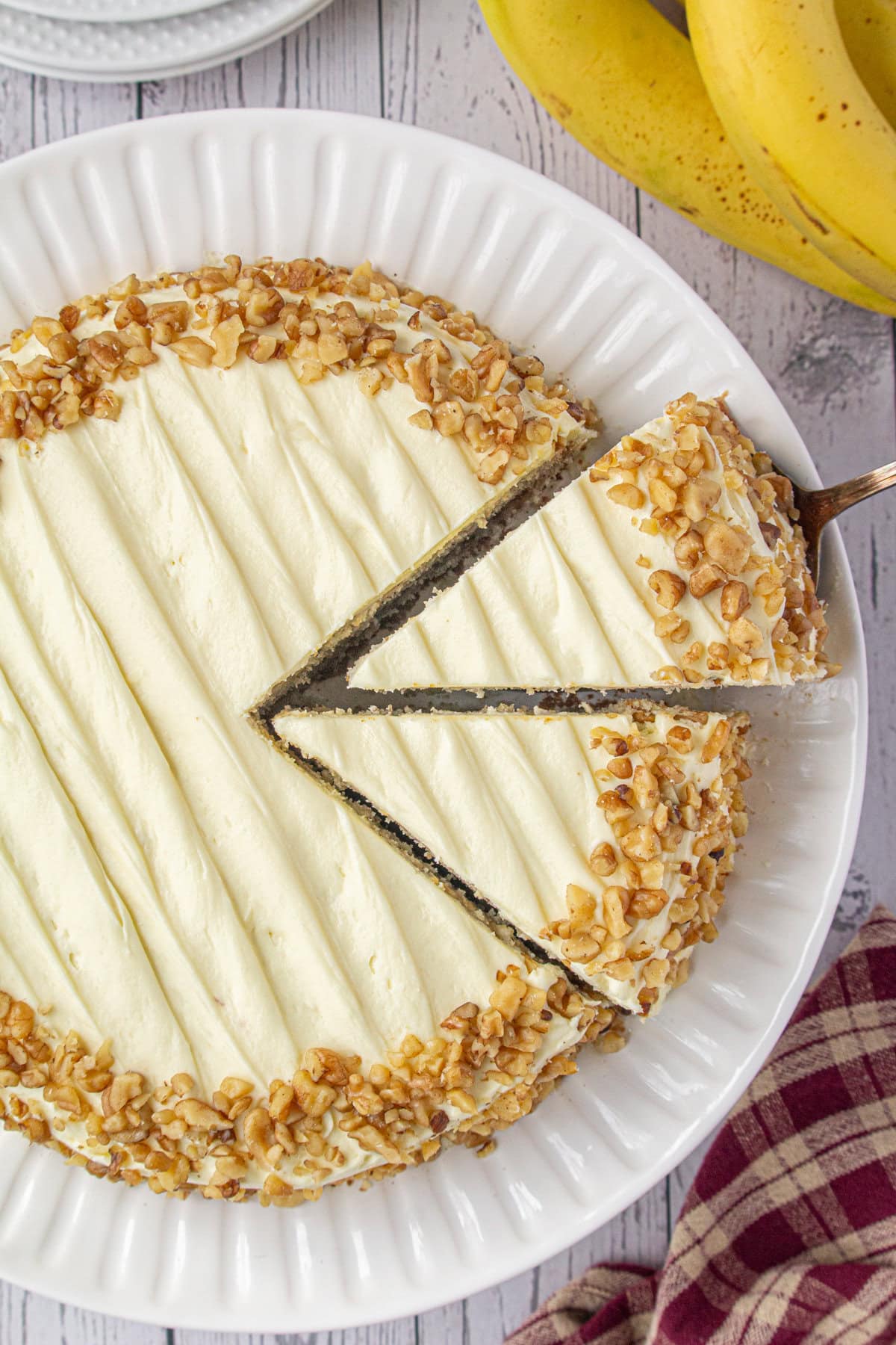 Slices of banana cake being served.