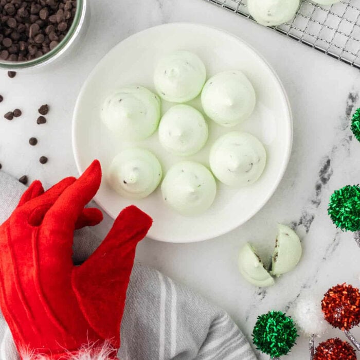 Mint chip meringue Christmas cookies on a plate.