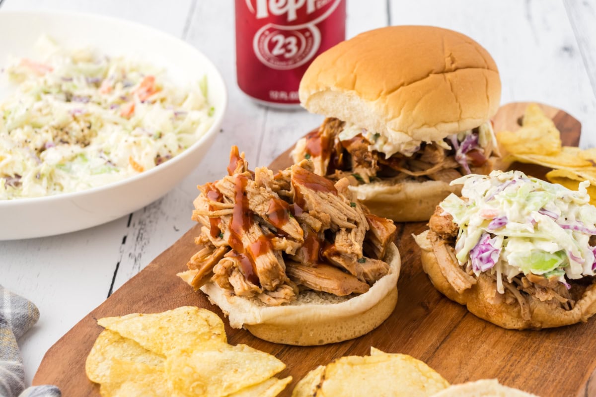 Dr Pepper pulled pork on a sandwich bun with coleslaw.