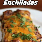 Beef enchiladas on a white plate with a title text overlay for Pinterest.