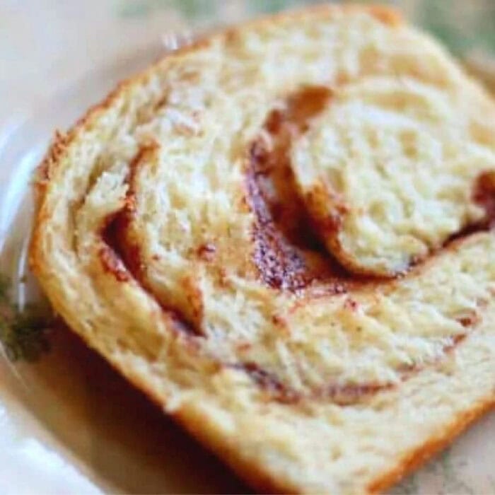 A slice of easy, buttermilk cinnamon swirl bread on a plate.