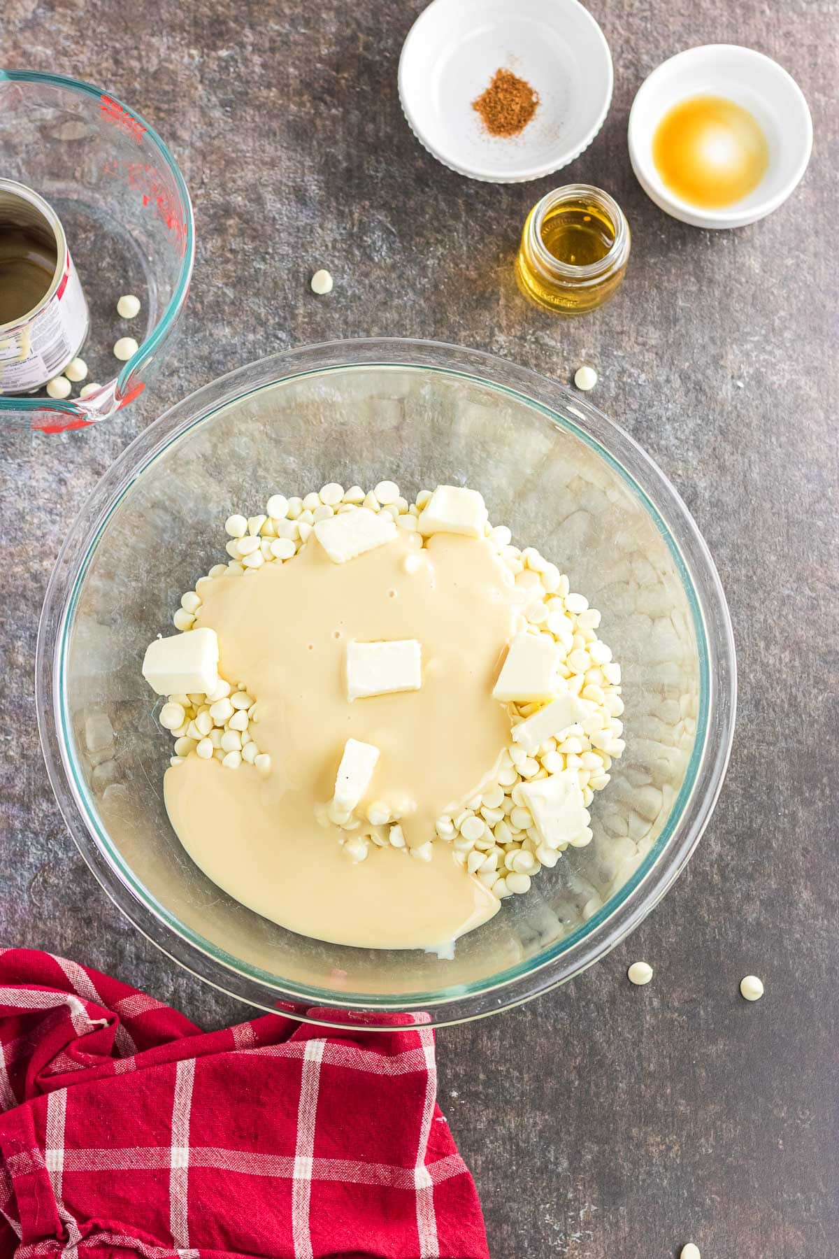 Melting the chocolate chips, butter, and condensed milk together.