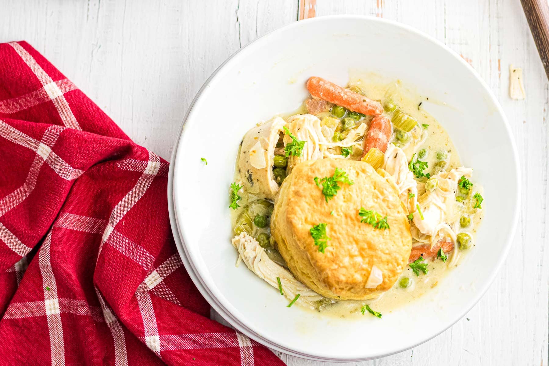 An overhead view of slow cooker chicken pot pie on a dinner plate.