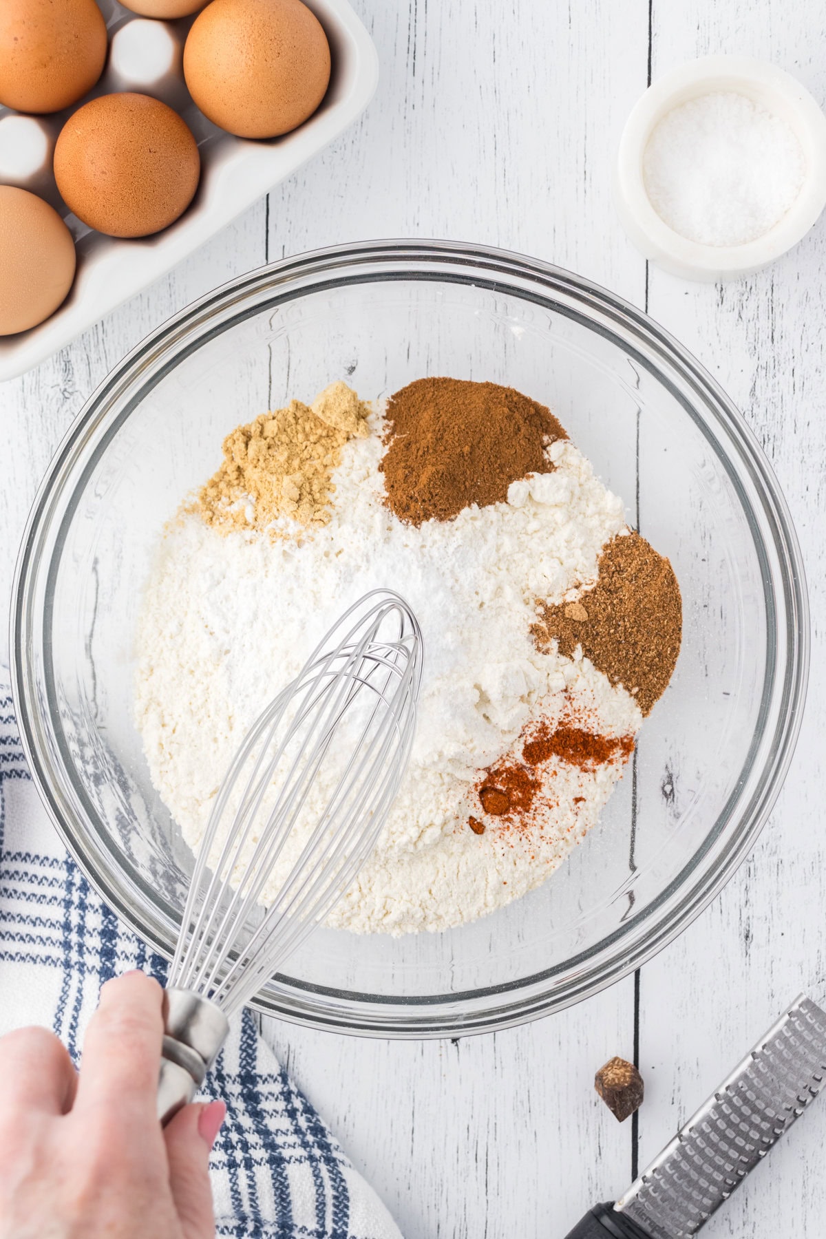 Spices being mixed into the flour.