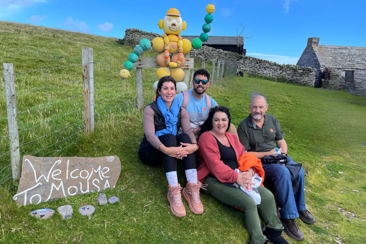 Marye Audet and family after a hike through Mousa Bach in Scotland.