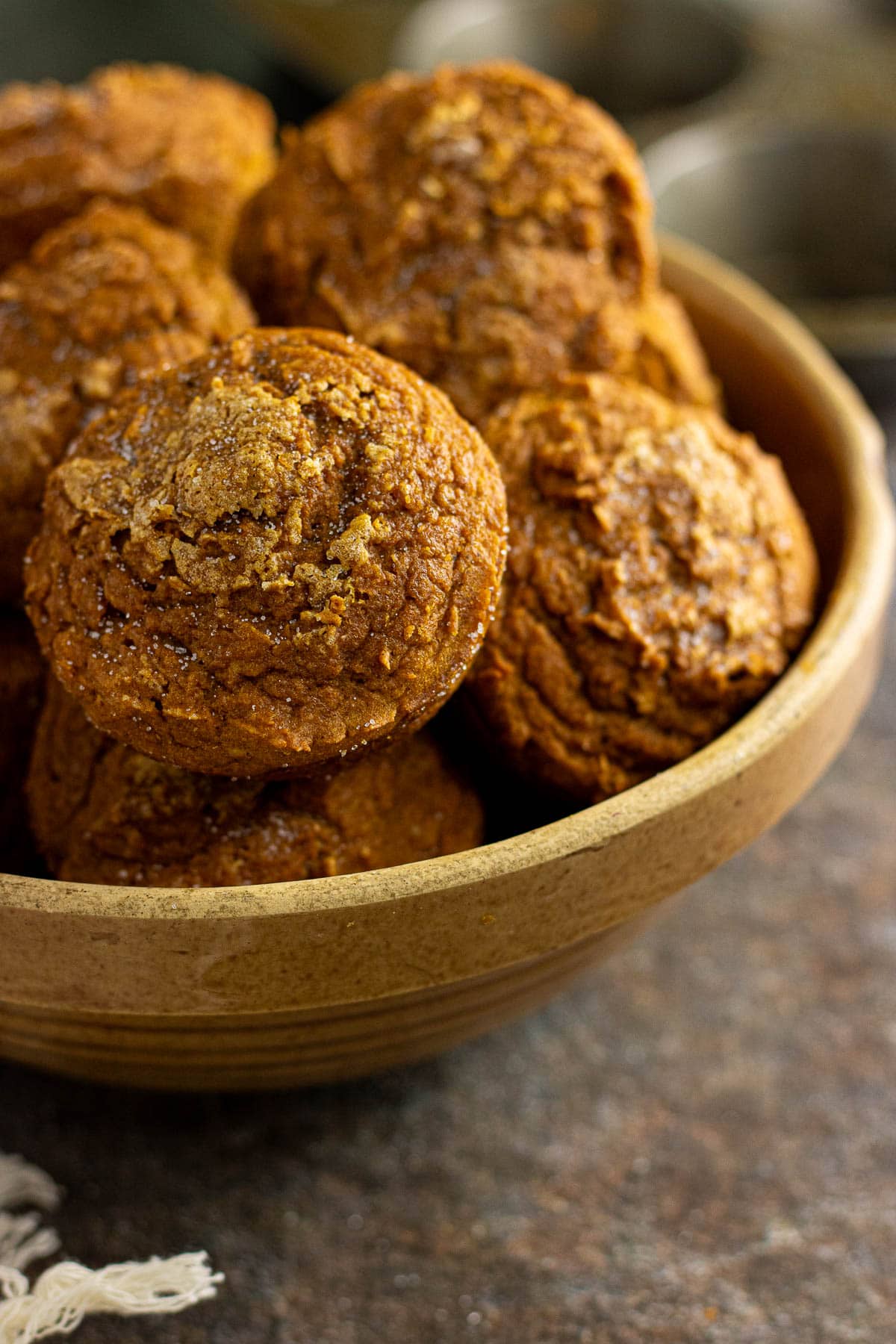 A close-up photo of the 3-ingredient pumpkin muffins in a bowl.