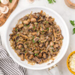 Overhead view of caramelized onions and mushrooms for feature image.