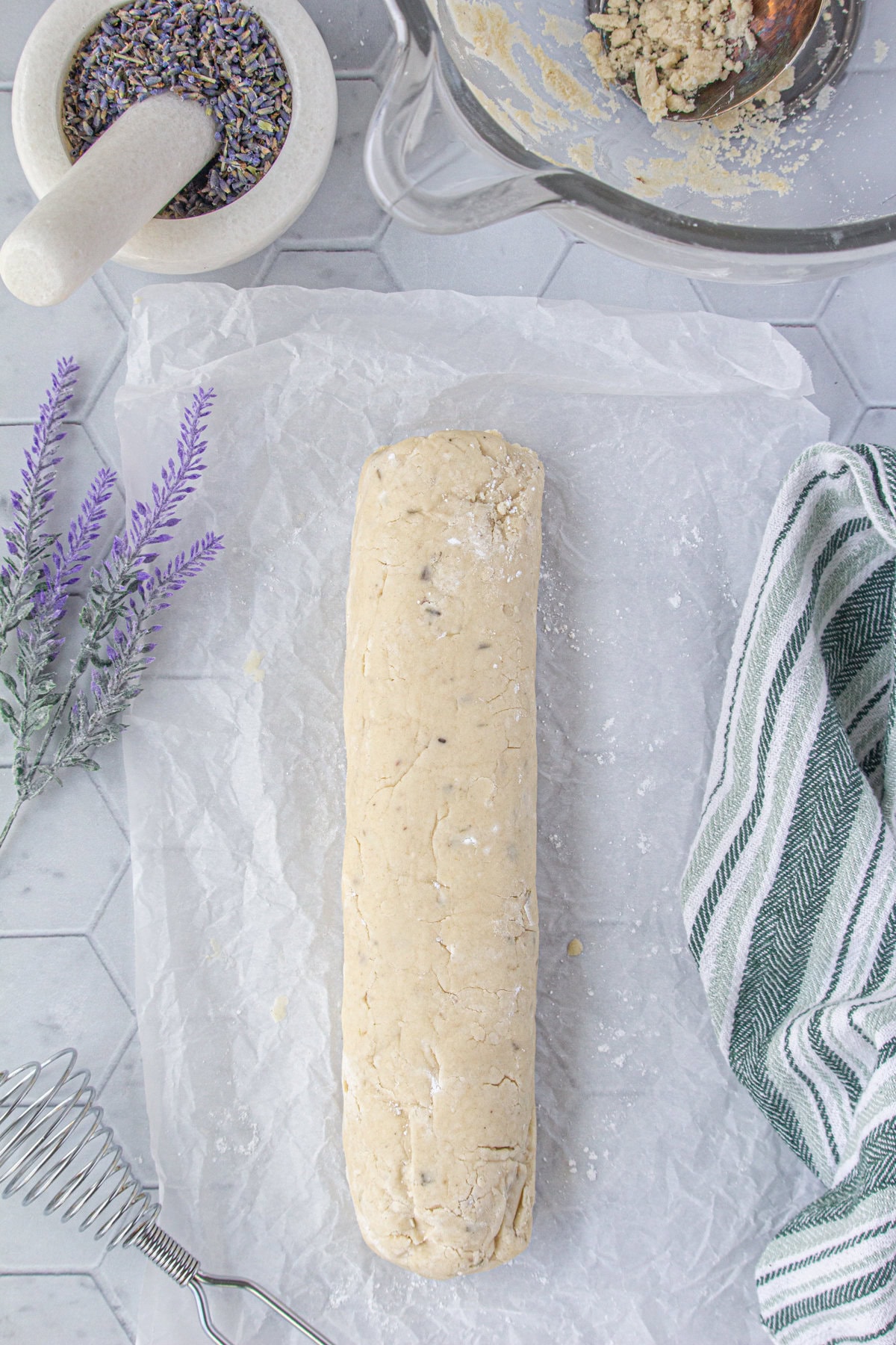 The dough rolled and formed into a log.