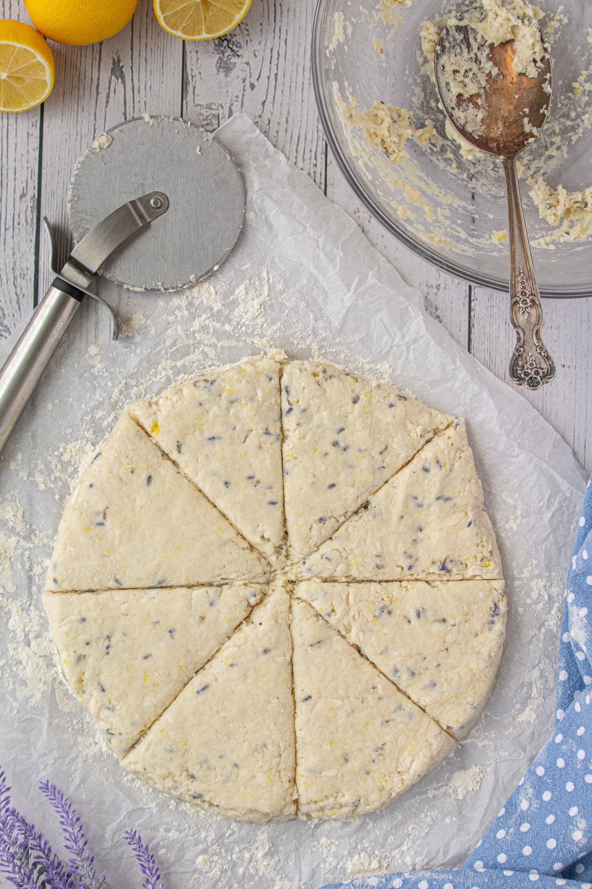 The dough patted into a circle and cut into eight wedges.