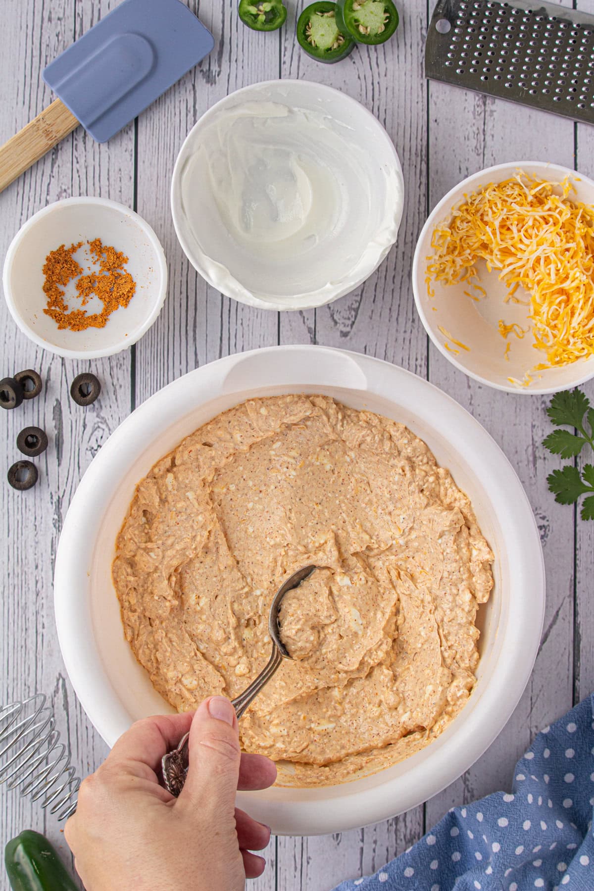 Stirring the cream cheese mixture.