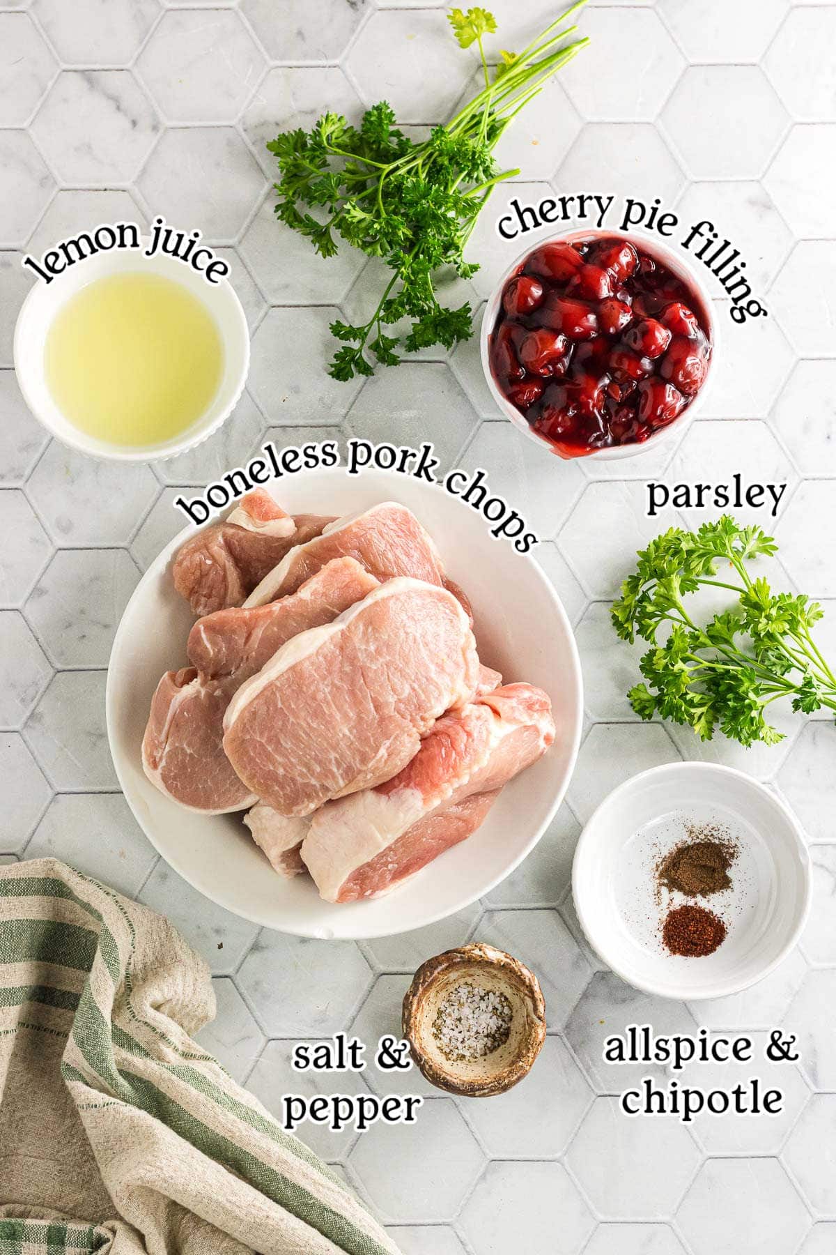 The ingredients for slow cooker cherry chipotle pork with text labels.