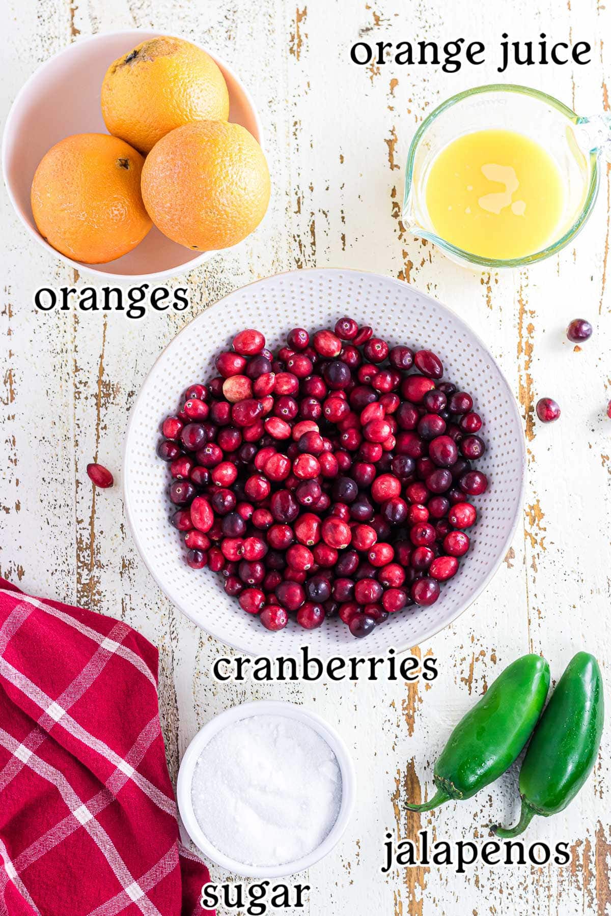 Labeled ingredients for jalapeno cranberry sauce.