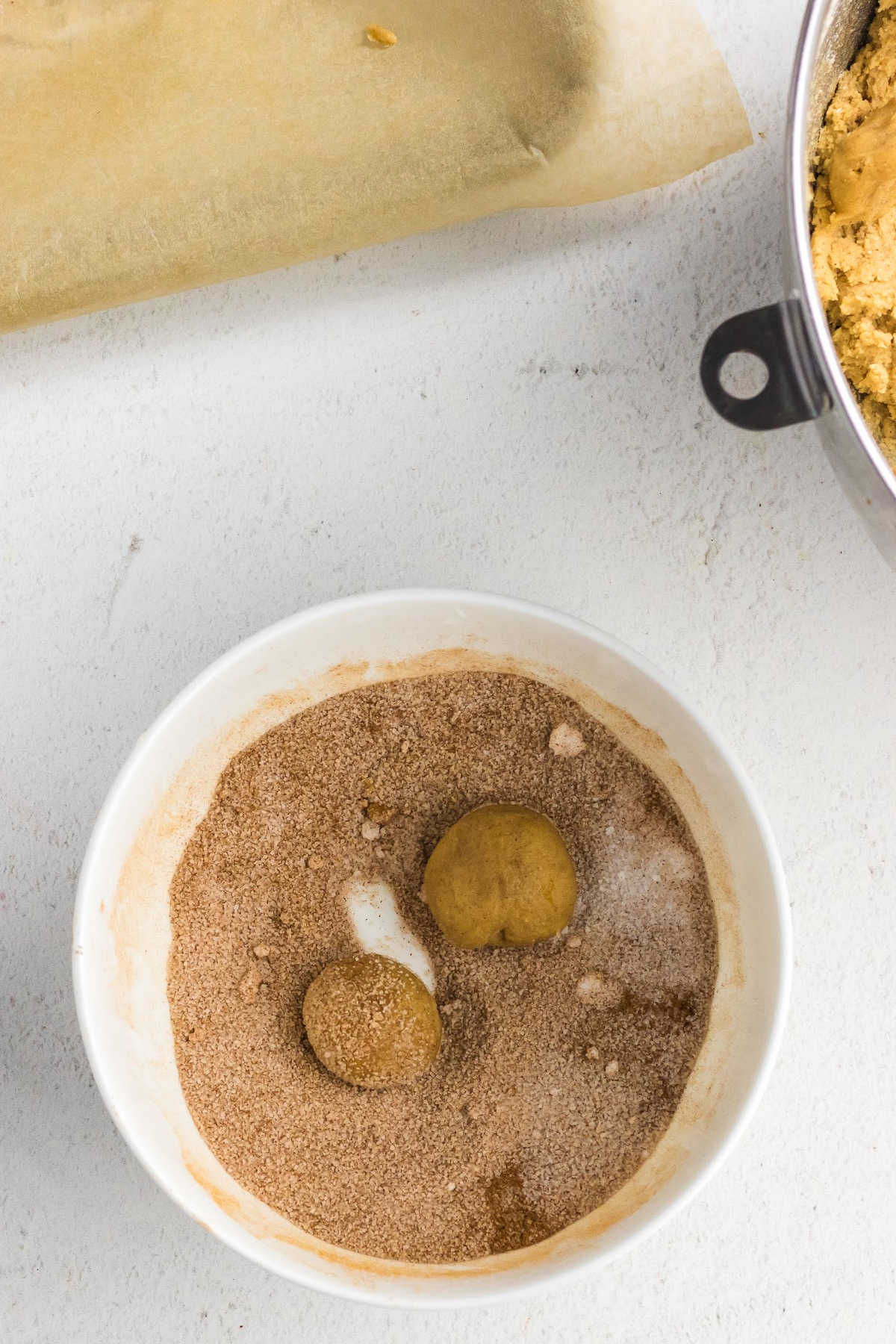 Balls of dough rolled in cinnamon and sugar.