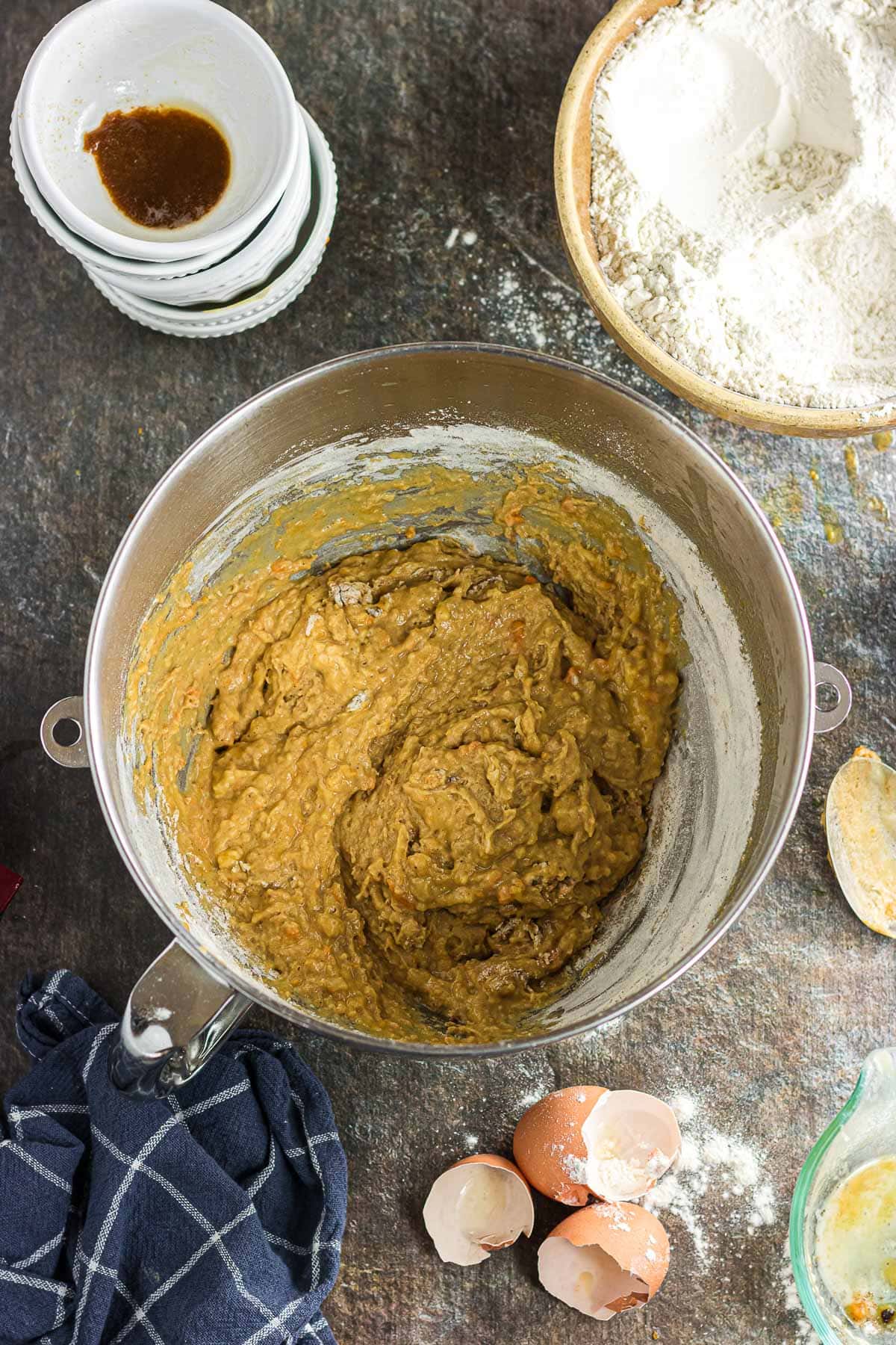 One cup of flour added to the ingredients in the mixing bowl.