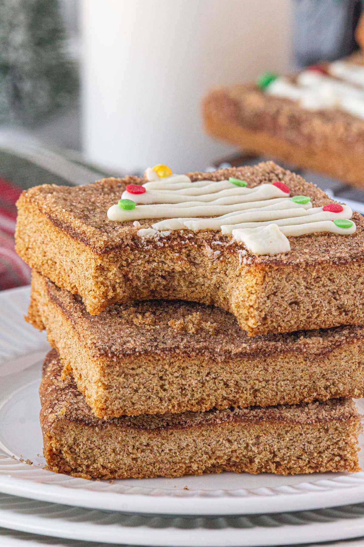 An up-close, side view of stacked snickerdoodle cookie bars.