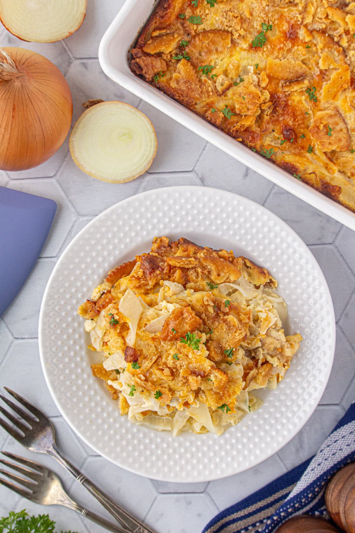 Southern sweet onion casserole on a dinner plate.