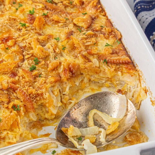 Closeup of Southern sweet onion casserole with a spoon in it.