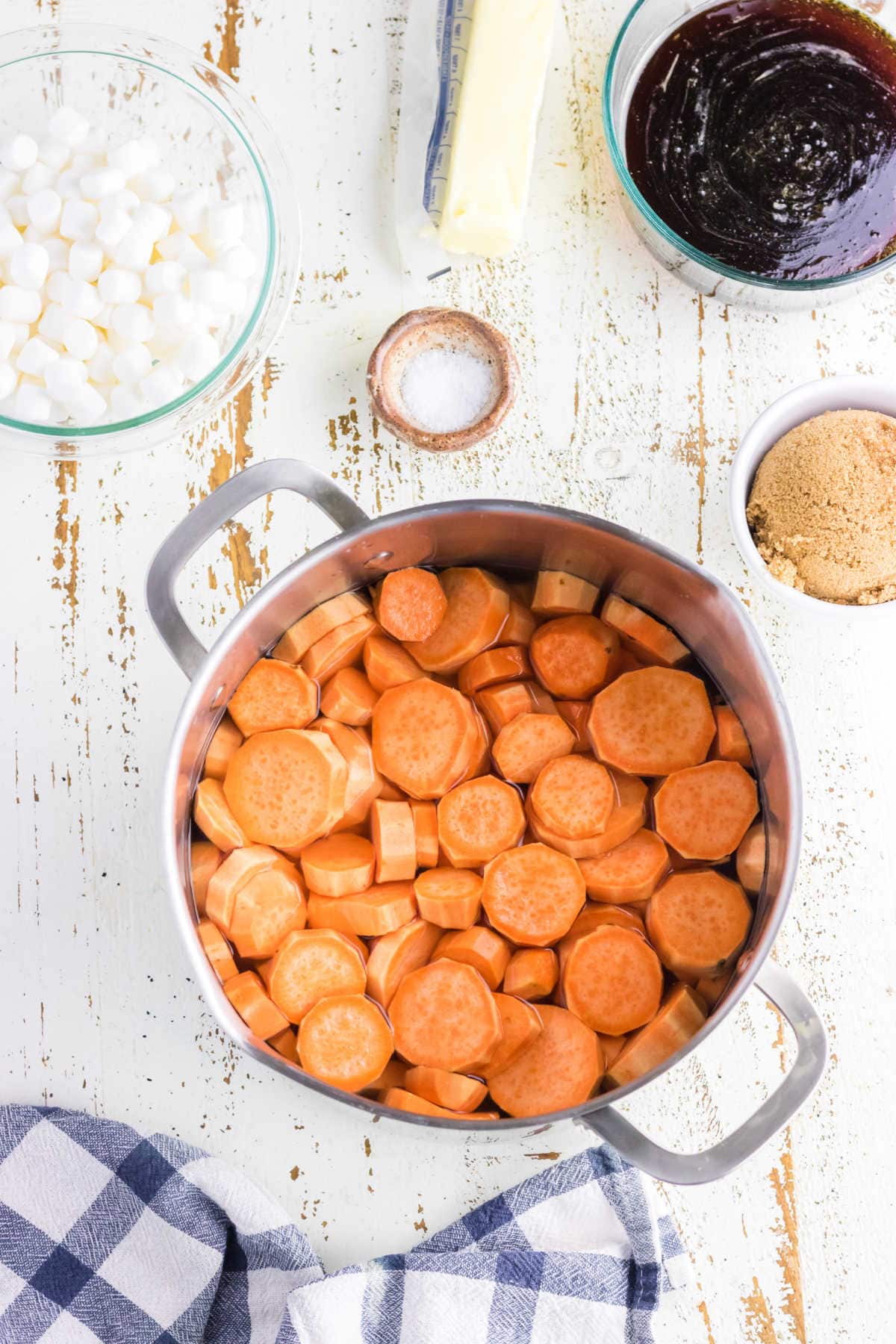 Sliced sweet potatoes in a pot.