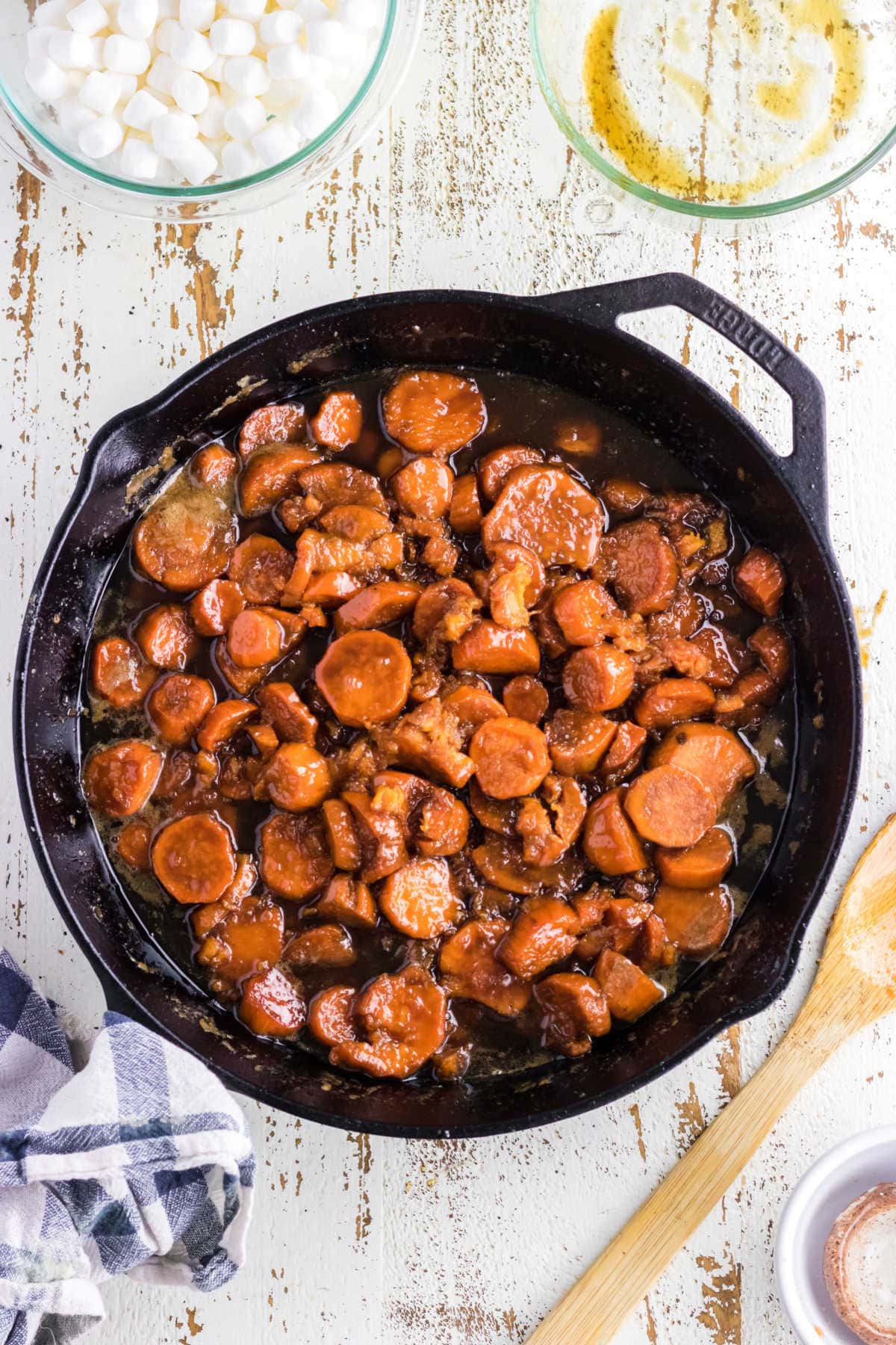 Glazed sweet potatoes in the skillet.