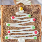 Snickerdoodle cookie bars with a white chocolate Christmas tree decoration.