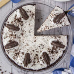 Overhead view of Oreo Icebox Pie being served from a pie dish.