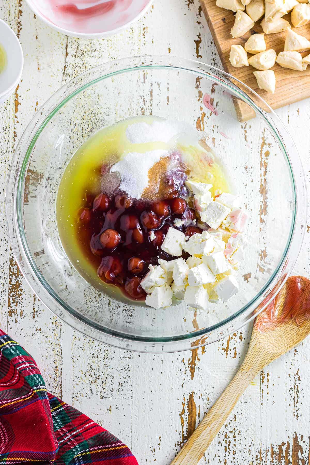 Stirring the cherry bubble up ingredients together.