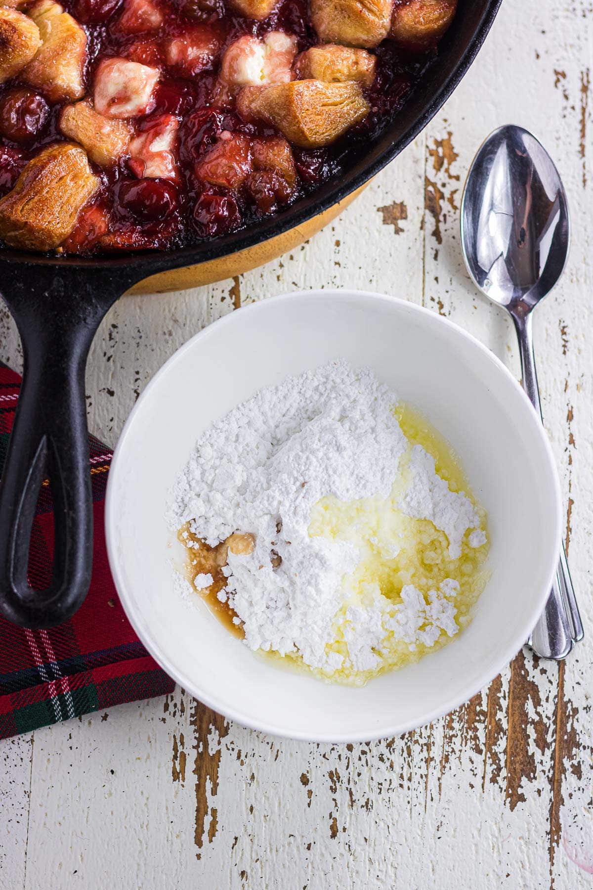 Whisking the glaze ingredients together.