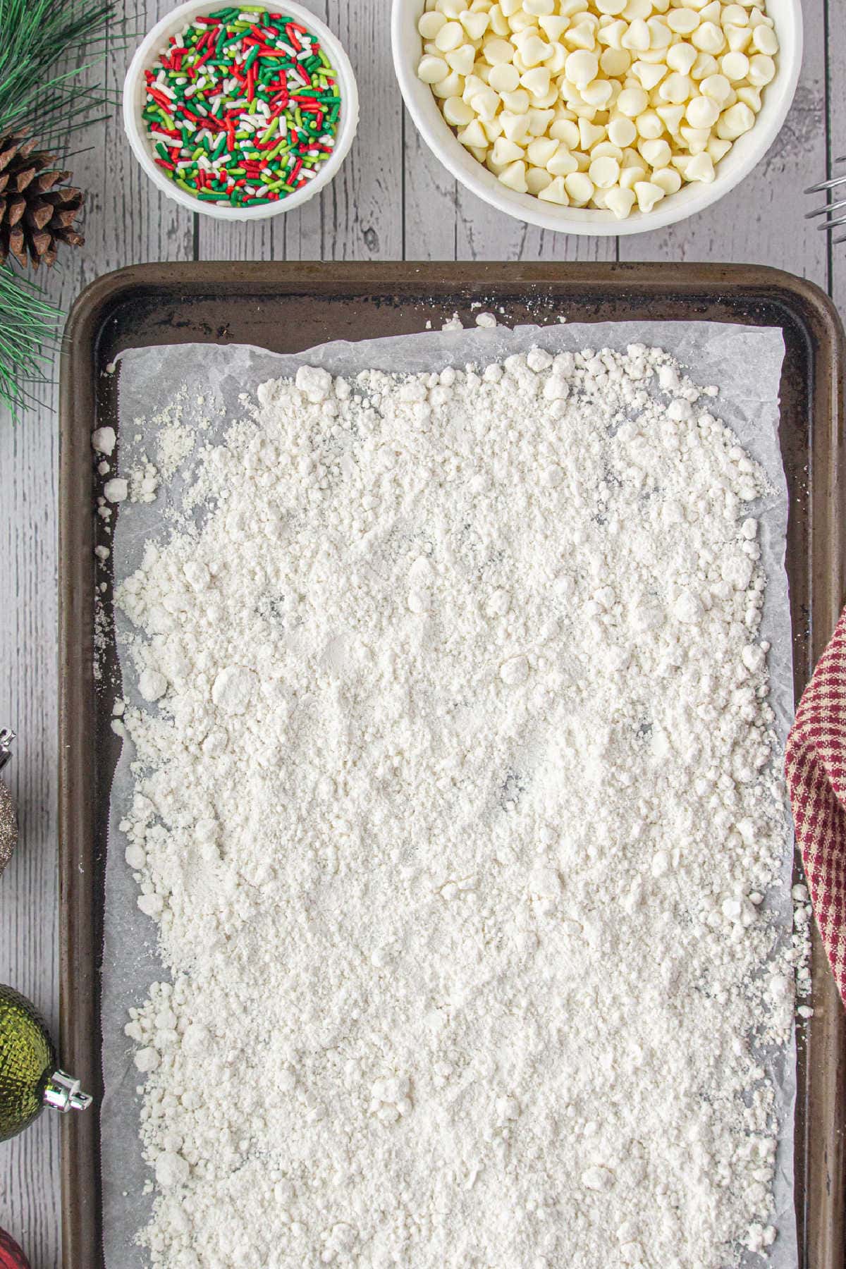 Dry sugar cookie mixture being baked.