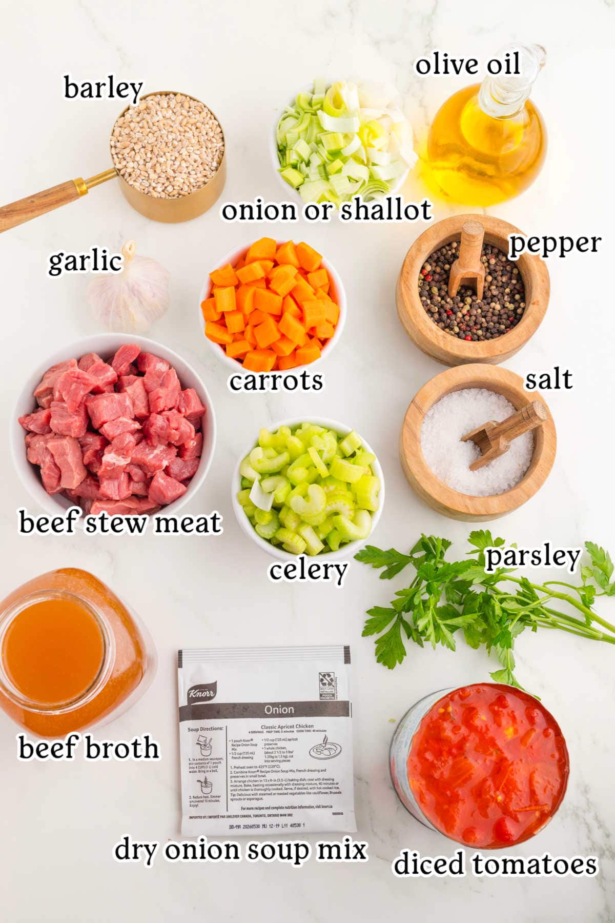 Labeled ingredients for beef and barley soup recipe.