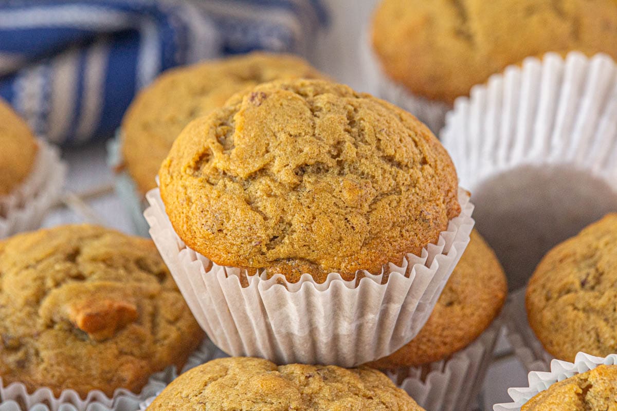 Closeup of a brown butter banana pecan muffin.