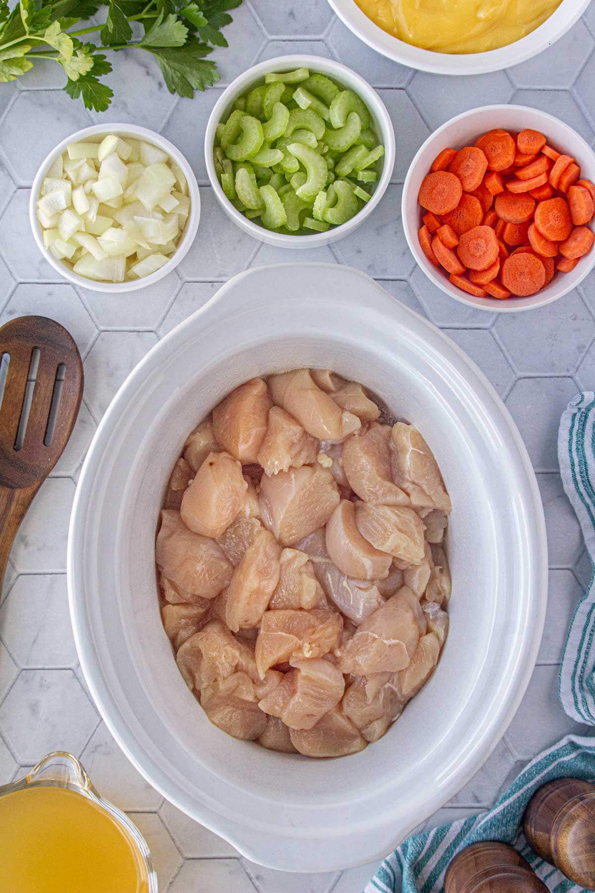 The diced chicken in the crockpot.