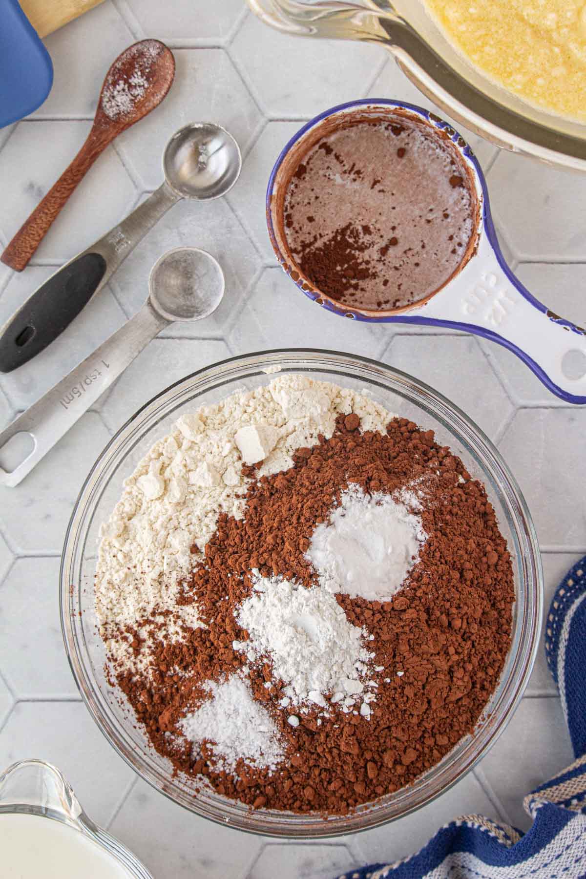 Mixing the dry ingredients together.