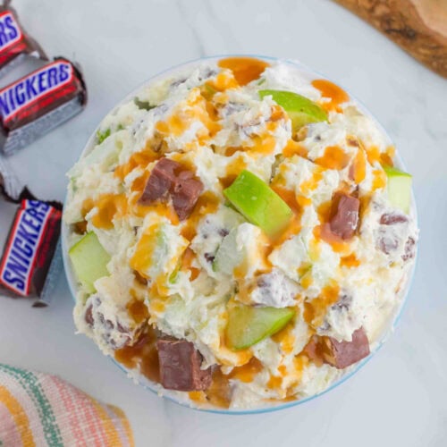 Overhead view of Snickers salad showing the caramel drizzle on top.